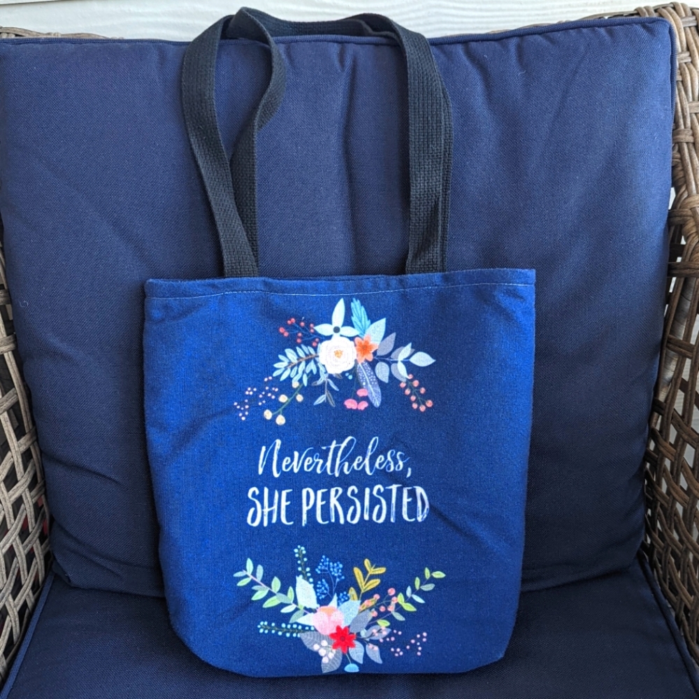 Society6 Nevertheless, She Persisted blue Tote Book Bag with flowers